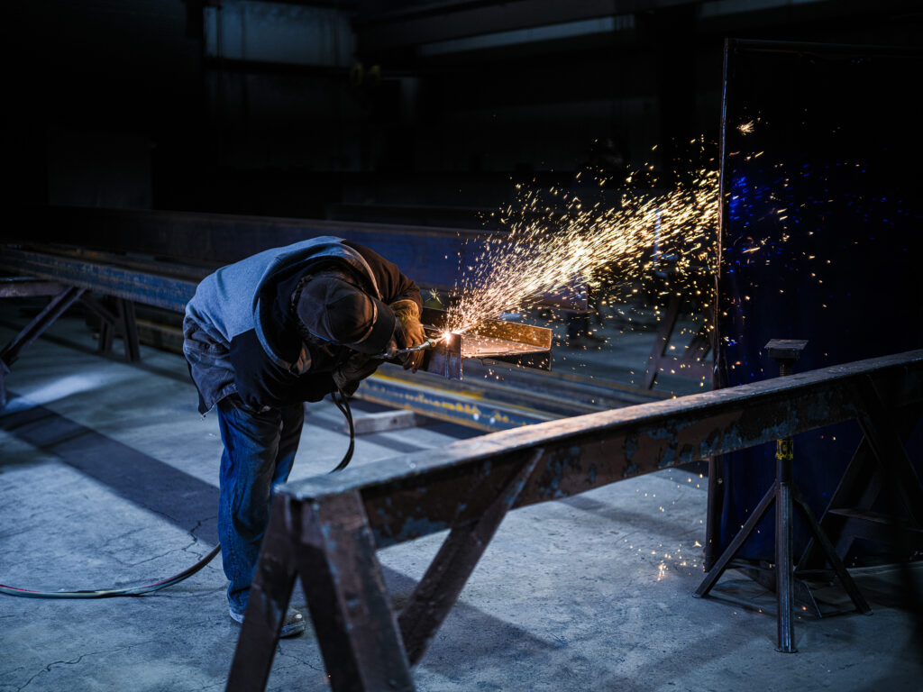 Intermark Steel employee welding.